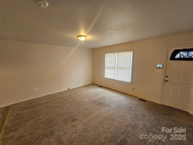 606 N St, Belmont, NC 28012 - carpeted entryway featuring baseboards