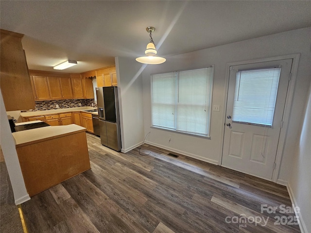 606 N St, Belmont, NC 28012 - kitchen featuring stainless steel refrigerator with ice dispenser, dark wood finished floors, pendant lighting, dishwasher, and decorative backsplash