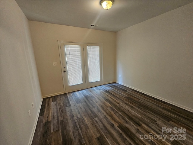606 N St, Belmont, NC 28012 - empty room with dark wood finished floors and baseboards