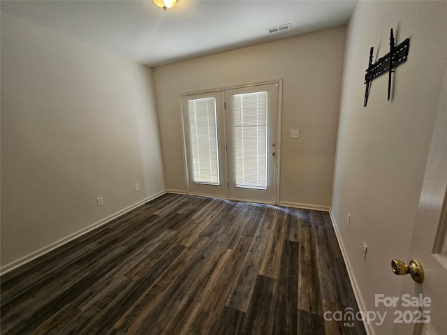 606 N St, Belmont, NC 28012 - unfurnished room with dark wood-type flooring and baseboards