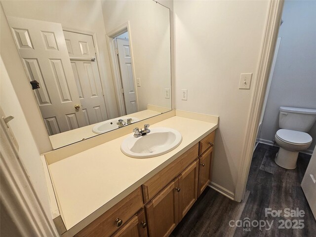 606 N St, Belmont, NC 28012 - bathroom featuring vanity and wood finished floors