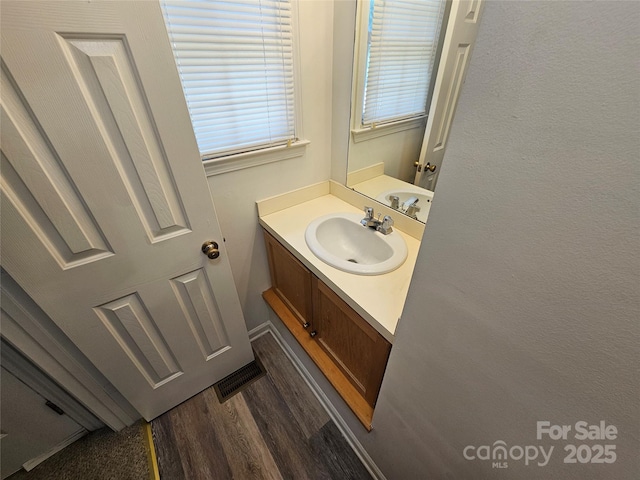 606 N St, Belmont, NC 28012 - bathroom featuring vanity and wood finished floors