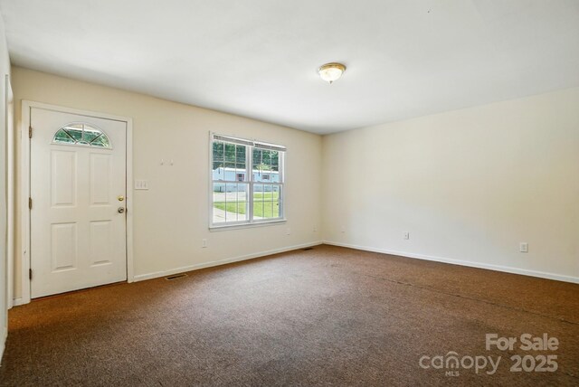 606 N St, Belmont, NC 28012 - foyer entrance with carpet and baseboards