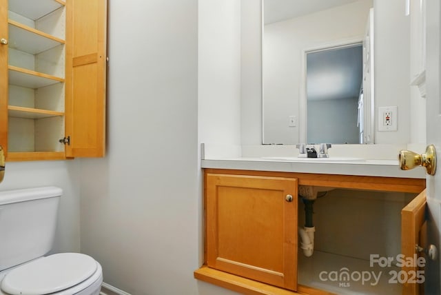 606 N St, Belmont, NC 28012 - half bathroom featuring toilet and vanity