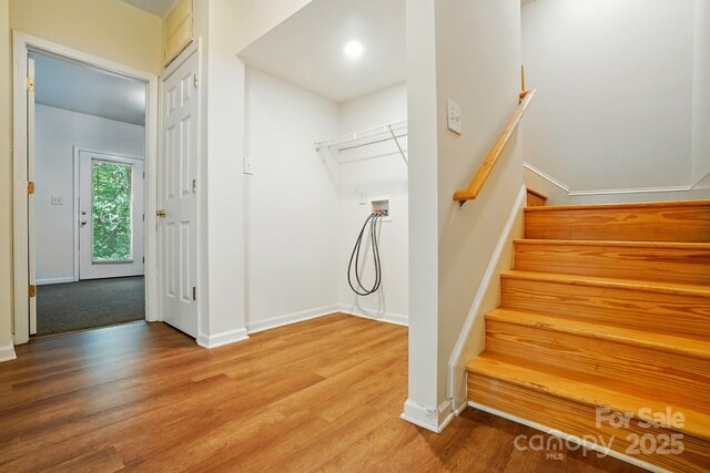 606 N St, Belmont, NC 28012 - staircase featuring wood finished floors and baseboards