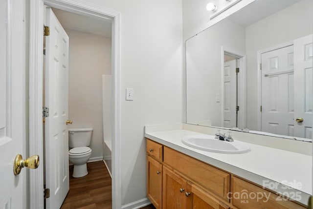 606 N St, Belmont, NC 28012 - full bath with vanity, wood finished floors, and a bathtub
