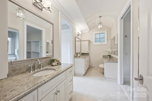 3032 Kings Manor Dr, Matthews, NC 28104 - full bathroom with two vanities and lofted ceiling