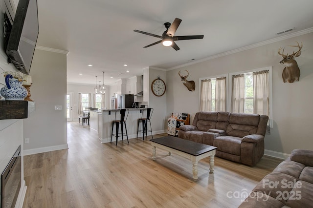1202 Neds Creek Rd, Kershaw, SC 29067 - living area with light wood-style floors, ceiling fan, recessed lighting, baseboards, and ornamental molding