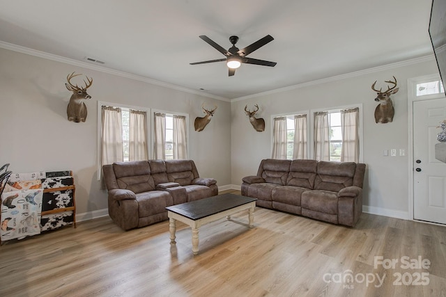 1202 Neds Creek Rd, Kershaw, SC 29067 - living room featuring ceiling fan, wood finished floors, crown molding, and baseboards
