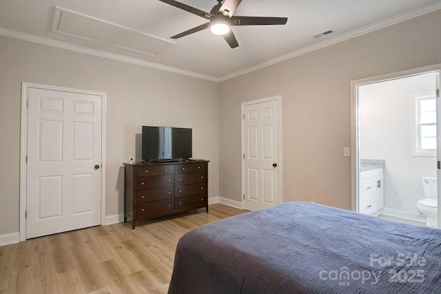 1202 Neds Creek Rd, Kershaw, SC 29067 - bedroom featuring attic access, light wood-style flooring, crown molding, ensuite bathroom, and baseboards