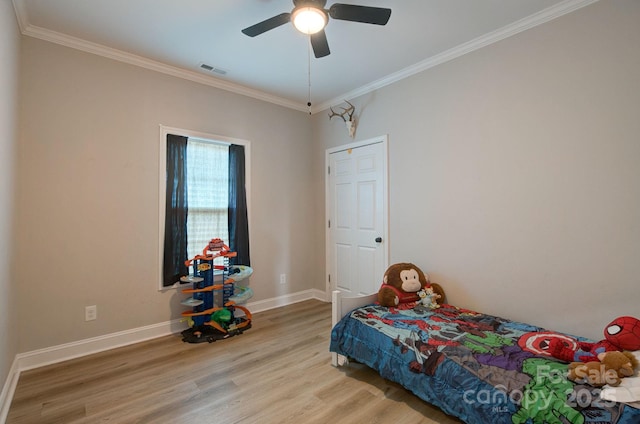 1202 Neds Creek Rd, Kershaw, SC 29067 - bedroom featuring wood finished floors, crown molding, baseboards, and ceiling fan