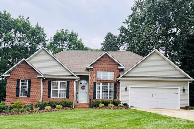 104 Laura Ct, Cherryville, NC 28021 - traditional-style home with an attached garage, a front lawn, brick siding, concrete driveway, and a shingled roof