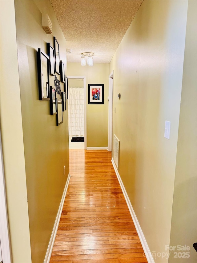 104 Laura Ct, Cherryville, NC 28021 - hall featuring light wood-style floors and a textured ceiling