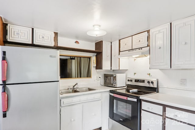 68 Cornwell Dr, Waynesville, NC 28786 - kitchen with stainless steel appliances, under cabinet range hood, a sink, and light countertops