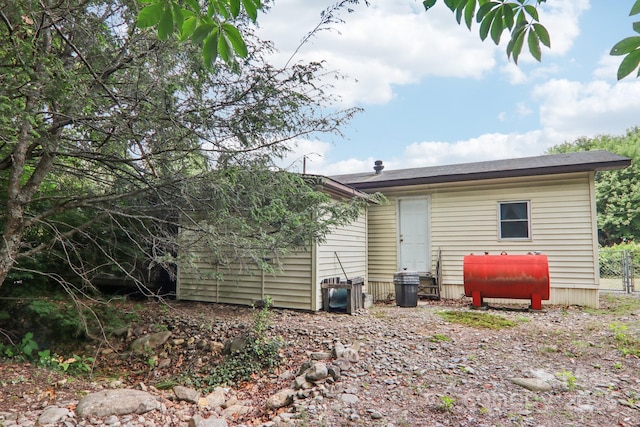68 Cornwell Dr, Waynesville, NC 28786 - rear view of property featuring oil tank
