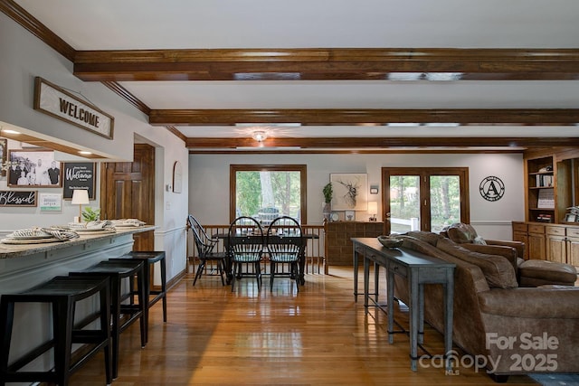 325 Chapman St, Chesterfield, SC 29709 - dining space featuring beam ceiling, healthy amount of natural light, wood finished floors, and crown molding