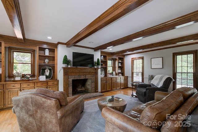 325 Chapman St, Chesterfield, SC 29709 - living area with beam ceiling, light wood-style floors, a brick fireplace, plenty of natural light, and recessed lighting