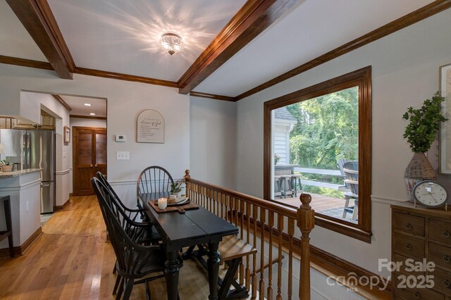 325 Chapman St, Chesterfield, SC 29709 - dining area featuring light wood-style floors, ornamental molding, and beamed ceiling