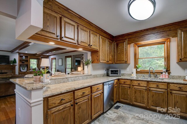 325 Chapman St, Chesterfield, SC 29709 - kitchen with a sink, stainless steel dishwasher, brown cabinets, and recessed lighting