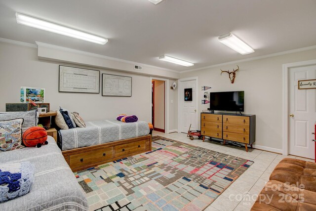325 Chapman St, Chesterfield, SC 29709 - bedroom with crown molding, light tile patterned floors, and baseboards