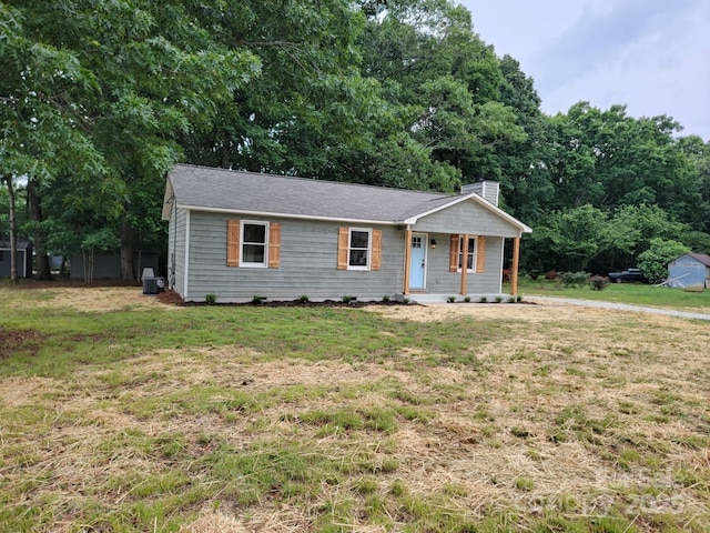 2070 Stirewalt Rd, China Grove, NC 28023 - view of front facade with a chimney, a front yard, and a porch