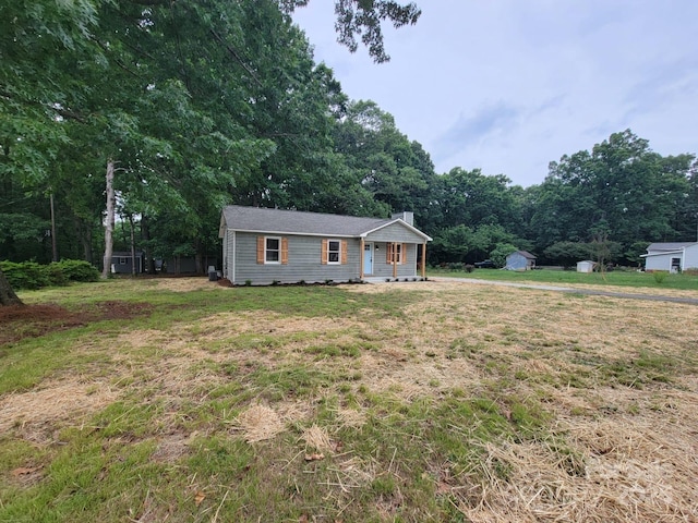 2070 Stirewalt Rd, China Grove, NC 28023 - single story home featuring a front yard and a chimney
