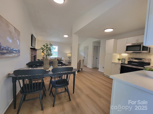 2070 Stirewalt Rd, China Grove, NC 28023 - dining space with light wood-style floors, baseboards, and recessed lighting