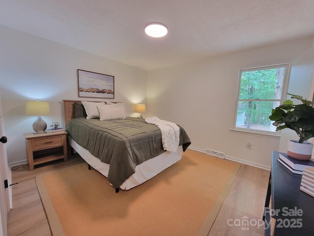 2070 Stirewalt Rd, China Grove, NC 28023 - bedroom featuring light wood-style floors and baseboards
