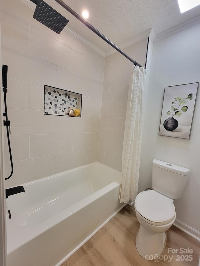2070 Stirewalt Rd, China Grove, NC 28023 - full bath featuring wood finished floors, ornamental molding, shower / bath combination with curtain, toilet, and baseboards