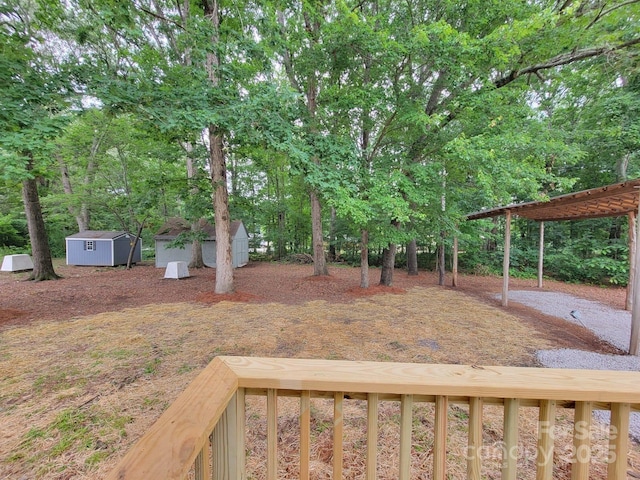 2070 Stirewalt Rd, China Grove, NC 28023 - view of yard with a carport and a pergola