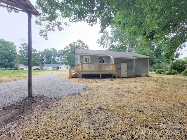 2070 Stirewalt Rd, China Grove, NC 28023 - view of front of property featuring a deck and view of wooded area