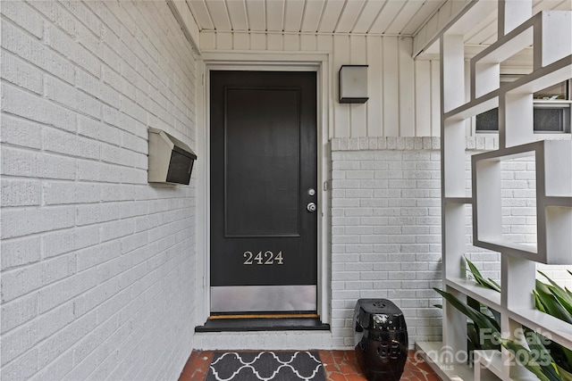 2424 Cumberland Ave, Charlotte, NC 28203 - entrance to property with board and batten siding and brick siding