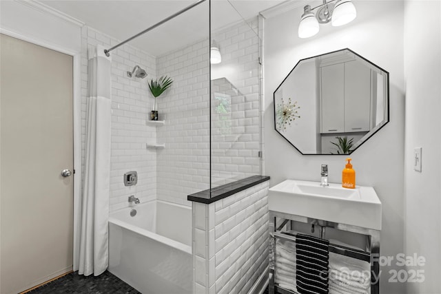 2424 Cumberland Ave, Charlotte, NC 28203 - full bathroom featuring shower / bath combination with curtain, baseboards, and a sink