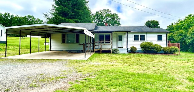 271 NC-16 Hwy N, Taylorsville, NC 28681 - ranch-style house with a carport, gravel driveway, and a front yard