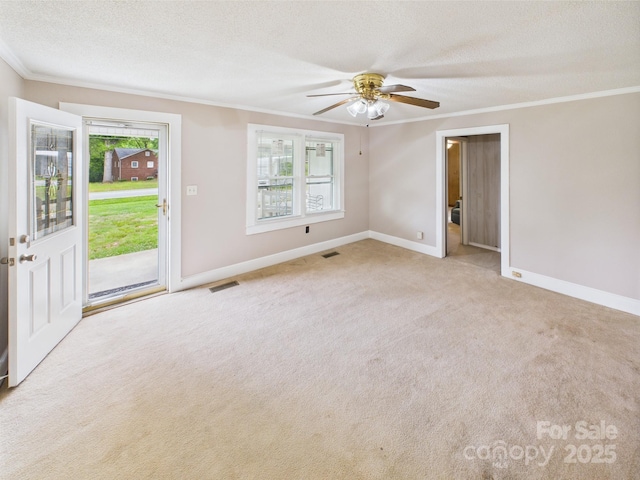 271 NC-16 Hwy N, Taylorsville, NC 28681 - carpeted spare room featuring ornamental molding, baseboards, a textured ceiling, and a ceiling fan