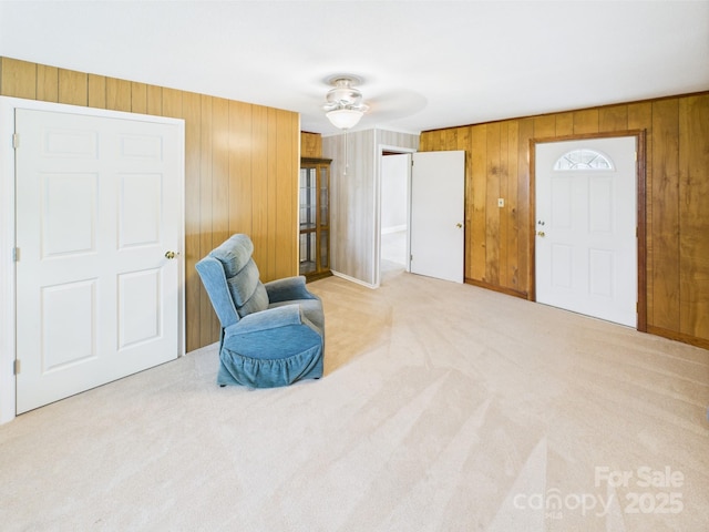 271 NC-16 Hwy N, Taylorsville, NC 28681 - sitting room featuring wooden walls, carpet floors, and ceiling fan