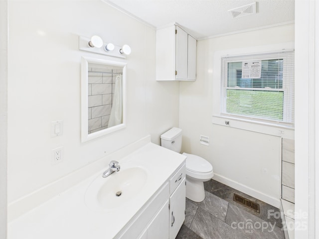 271 NC-16 Hwy N, Taylorsville, NC 28681 - bathroom featuring vanity, toilet, a shower with shower curtain, stone finish floors, and a textured ceiling