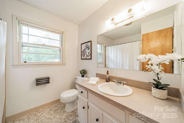 1188 Rainbow Cir, Catawba, SC 29704 - full bathroom featuring toilet, vanity, baseboards, and curtained shower