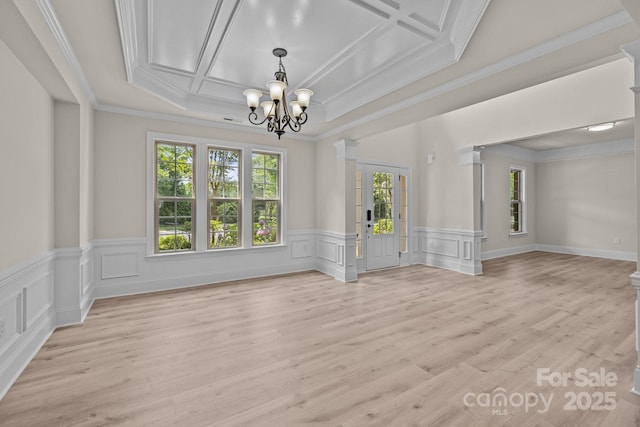 10508 Kristens Mare Dr, Charlotte, NC 28277 - spare room with plenty of natural light, a chandelier, coffered ceiling, ornamental molding, and a wainscoted wall