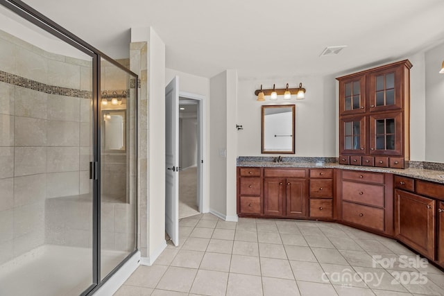 10508 Kristens Mare Dr, Charlotte, NC 28277 - full bath featuring tile patterned flooring, vanity, and a shower stall