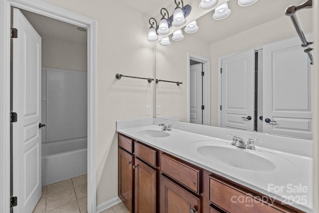 10508 Kristens Mare Dr, Charlotte, NC 28277 - bathroom with double vanity, tile patterned floors, baseboards, and shower / washtub combination