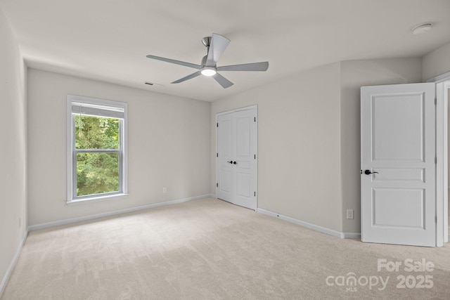 10508 Kristens Mare Dr, Charlotte, NC 28277 - unfurnished bedroom with carpet flooring, baseboards, and ceiling fan