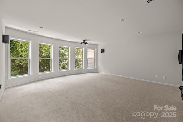 10508 Kristens Mare Dr, Charlotte, NC 28277 - unfurnished room featuring healthy amount of natural light, carpet floors, and recessed lighting