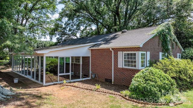 4002 Hickory Blvd, Granite Falls, NC 28630 - rear view of property with brick siding, a sunroom, and a shingled roof