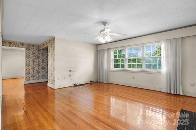 4002 Hickory Blvd, Granite Falls, NC 28630 - spare room featuring light wood-style flooring and ceiling fan