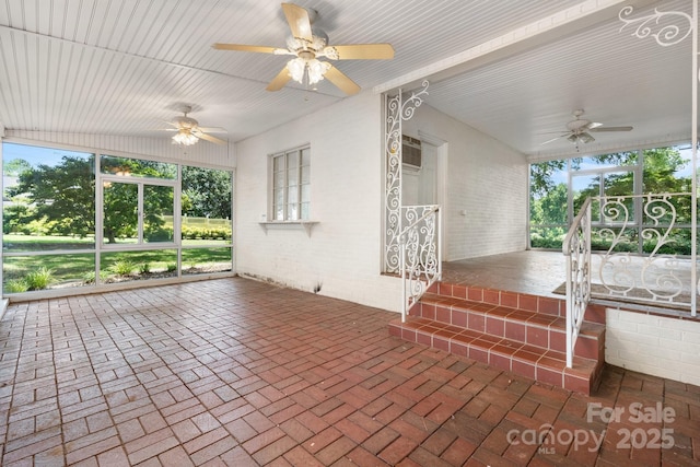 4002 Hickory Blvd, Granite Falls, NC 28630 - unfurnished sunroom with a ceiling fan