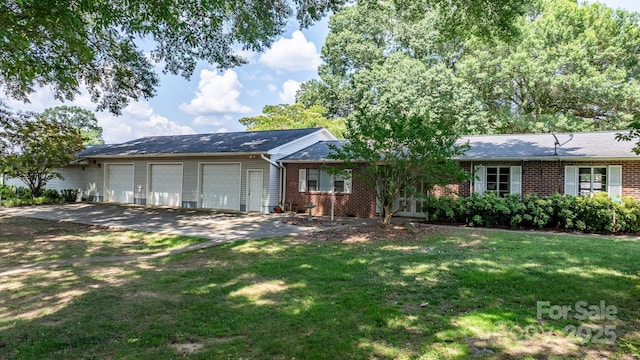 4002 Hickory Blvd, Granite Falls, NC 28630 - ranch-style house featuring a garage, brick siding, a front lawn, and driveway