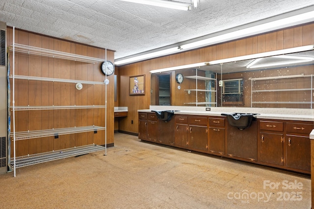 4002 Hickory Blvd, Granite Falls, NC 28630 - kitchen featuring light countertops and wooden walls