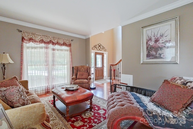 8409 Olde Stonegate Ln, Mint Hill, NC 28227 - living room with wood finished floors, ornamental molding, and stairs