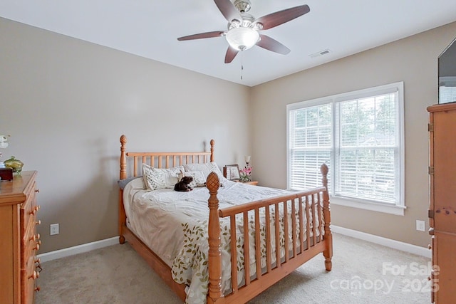 8409 Olde Stonegate Ln, Mint Hill, NC 28227 - bedroom featuring light carpet, baseboards, and a ceiling fan